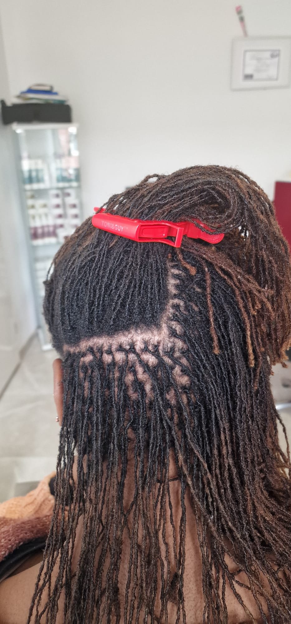 Sisterlocks retightening session by Locks by Rose